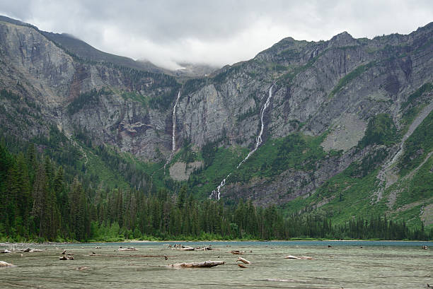 istock wide angle of Avalanche lake in cloudy day 483497374