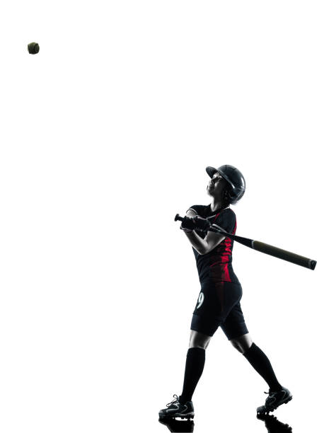 istock woman playing softball players silhouette isolated 483498036