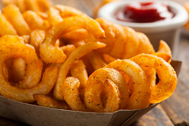 istock Spicy Seasoned Curly Fries 483503423