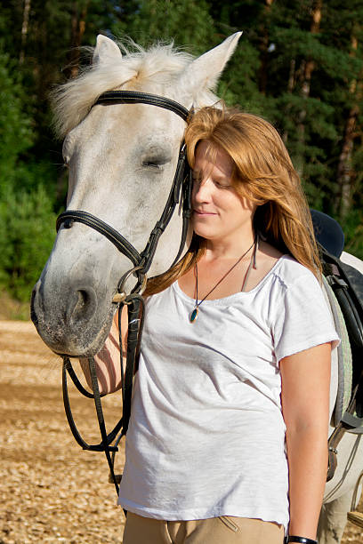 istock Horse and woman close 483504196