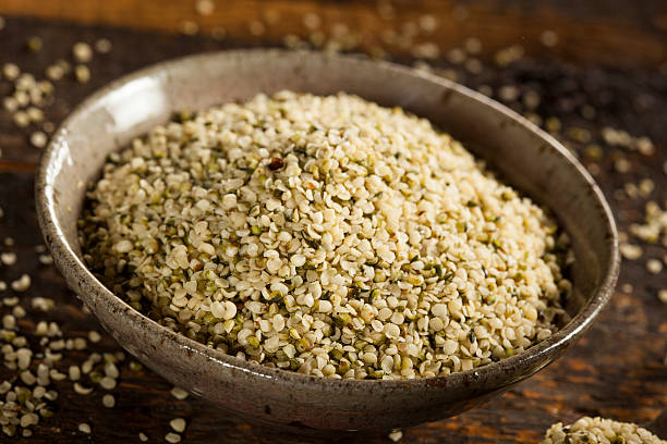 органические семена hulled пенька - hemp seed nut raw стоковые фото и изображения