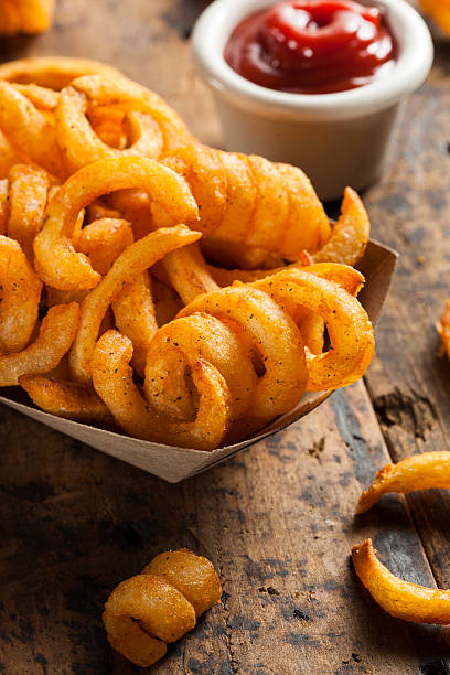 istock Spicy Seasoned Curly Fries 483505403