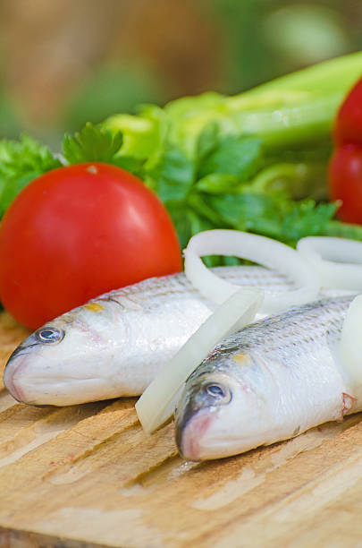 istock Mugil cephalus fish with vegetables. 483506999