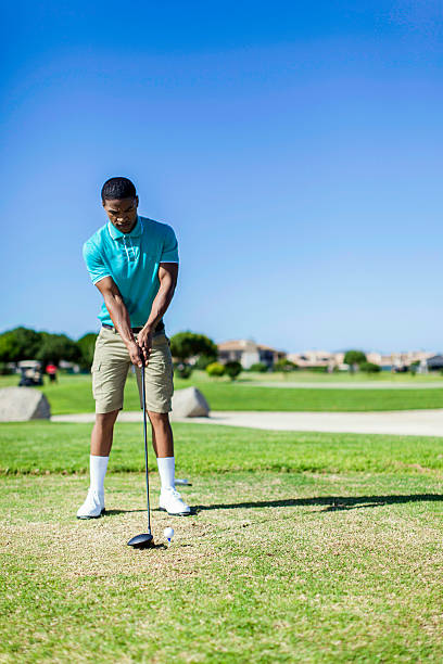 istock African golfer about to hit the ball 483507603