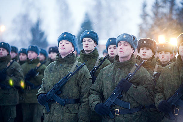 Recruit on the oath Pskov, Russia - January 15, 2011: Day of taking the oath of young guard of Russian army recruitment. 76 air assault division, unit number 07264. Location - street. General Margelov, Pskov. russian military photos stock pictures, royalty-free photos & images