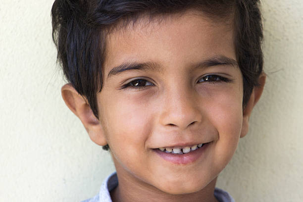 istock Portrait of a little boy against colored background 483512228