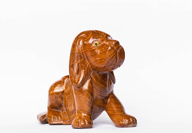 istock Wood carved dogs On a white background 483512286