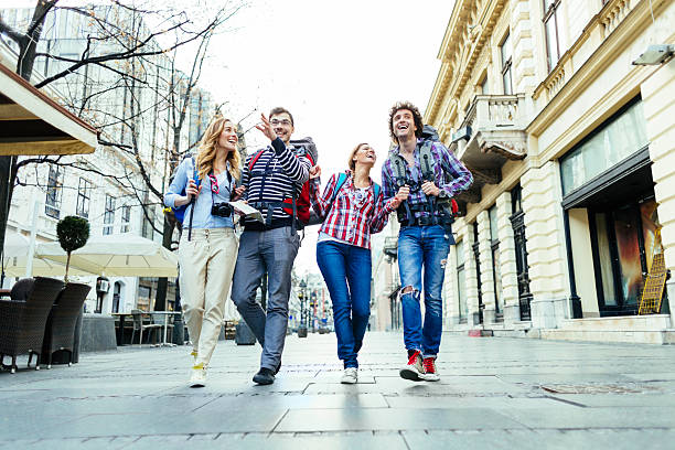 istock Happy Backpackers in the city. 483527811