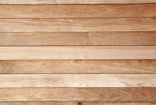 Close up view of wooden wall panel of building.