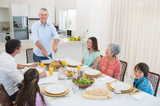 istock Family all together at christmas dinner 483528353