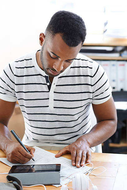 istock Doing a little business research 483529847