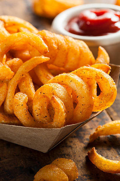 istock Spicy Seasoned Curly Fries 483530153