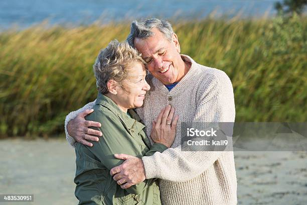 Senior Couple Hugging Stock Photo - Download Image Now - 60-69 Years, 65-69 Years, 70-79 Years