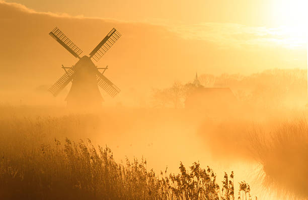 istock Windmill in the yellow fog 483531319