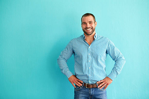 Man standing in front of wall