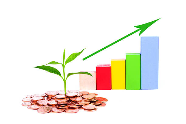 istock bussiness concept:growing plant in coin isolated on white background 483532383