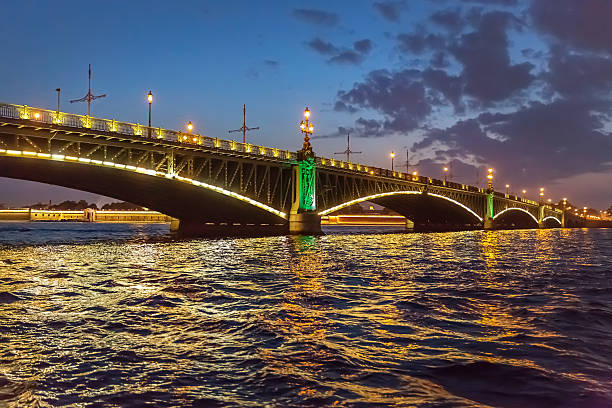 White Nights in St. Petersburg. Famous Trinity Bridge, Troitsky Most, across the River Neva, built in the late 19th century. St. Petersburg, Russia
