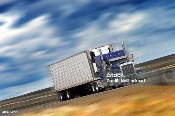 Speeding Big Rig Semi Truck Stock Photo - Download Image Now - Activity, Blue, Blurred Motion