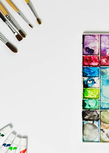 istock art palette with brushes and paints 483534638