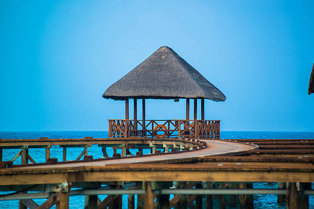 istock Over water bungalows with steps into amazing green lagoon 483536784