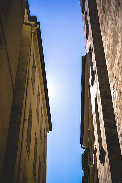 istock Alleyway View Looking Up at Sky 483539652