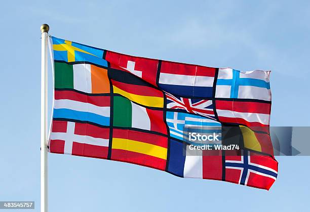 Foto de Pan Bandeira Europeia Contra O Céu Azul e mais fotos de stock de Bandeira Dinamarquesa - Bandeira Dinamarquesa, Amarelo, Azul