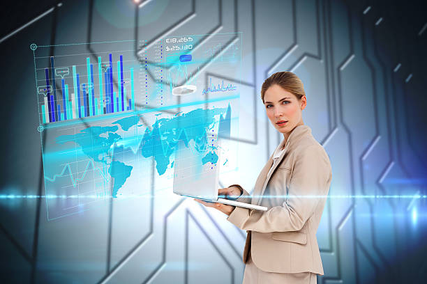 istock Stern businesswoman using laptop with interface 483545845
