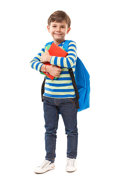 little estudante sorridente no fundo branco - child little boys isolated standing - fotografias e filmes do acervo