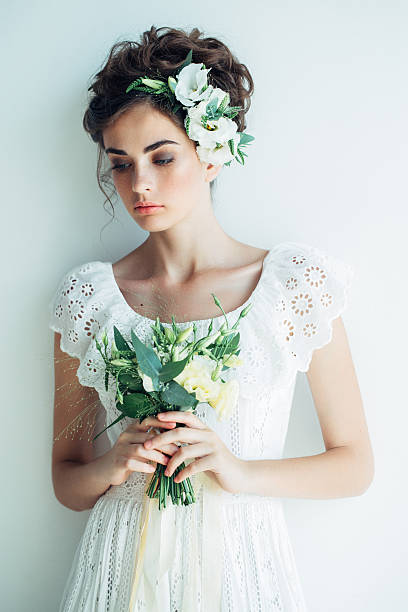 istock Studio shot of young beautiful bride on light background 483546376