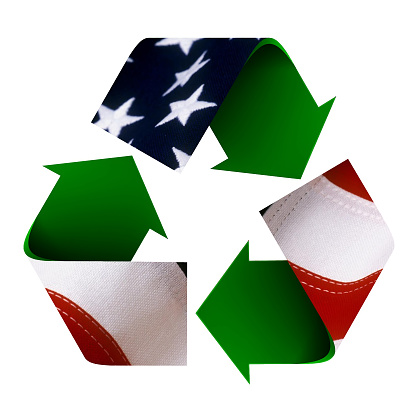Flag of USA superimposed on a recycle symbol. Isolated on a white background.
