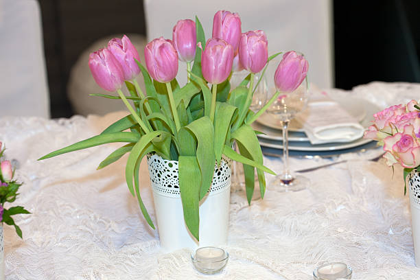 istock Table decorated with candles and tulips 483546937