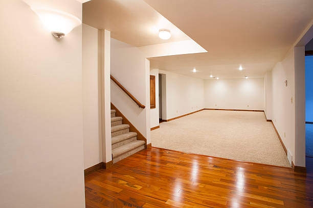 istock Spacious Finished Basement with Carpet and Hardwood Floors 483546981