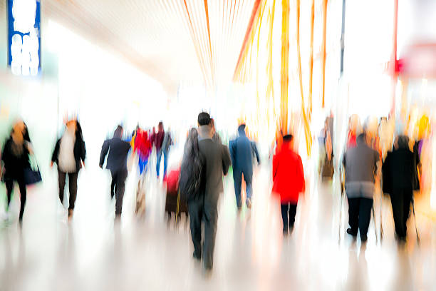 istock Motion Blurred Travellers Rushing at Airport 483550280