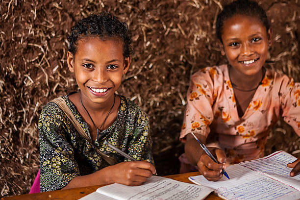 istock African little girla learning Amharic language 483551660