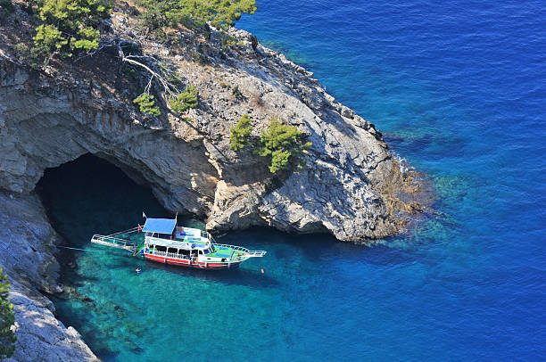 Blue cave "Gulet" leisure boat on the Turkish Mediterranean. marmaris stock pictures, royalty-free photos & images