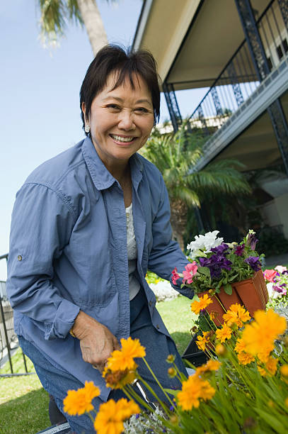 istock Woman Enjoying Gardening 483559327