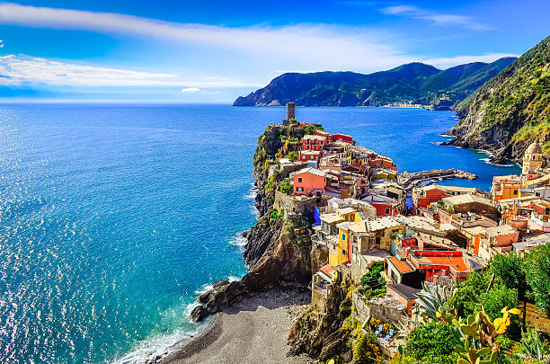 Scenic view of colorful village Vernazza in Cinque Terre Scenic view of colorful village Vernazza and ocean coast in Cinque Terre, Italy liguria photos stock pictures, royalty-free photos & images
