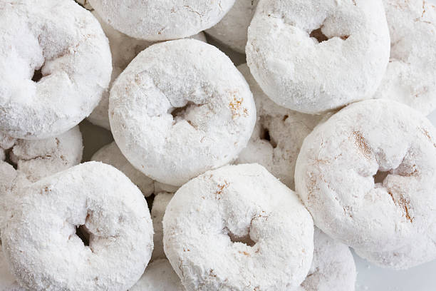 Breakfast is Served Plate of powdered sugar donuts powdered sugar stock pictures, royalty-free photos & images