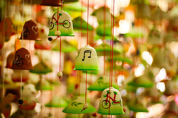 Ceramic wind bell in Bat Trang village - Vietnam Bát Tràng (literally: bát is bowl and tràng is workshop) is an old, well established village in the Gia Lâm district of Hanoi, the capital city of Vietnam. It is about 13 km from central Hanoi. bat trang stock pictures, royalty-free photos & images