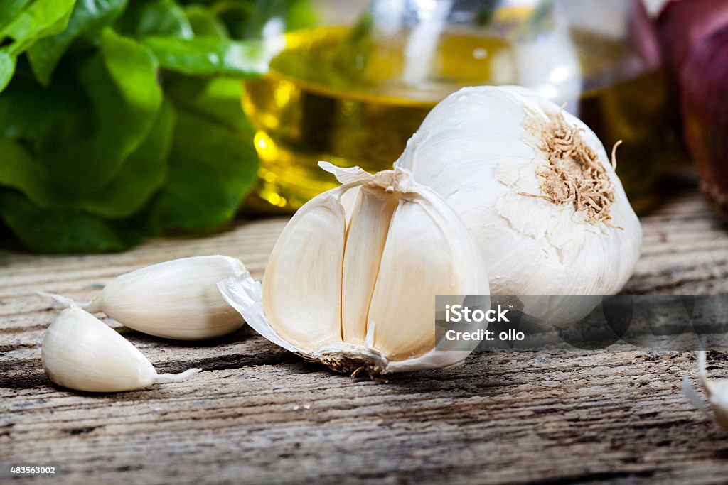 Fresh garlic wood vegetable Fresh garlic clove on wooden table - vegetable, vegetarian food 2015 Stock Photo