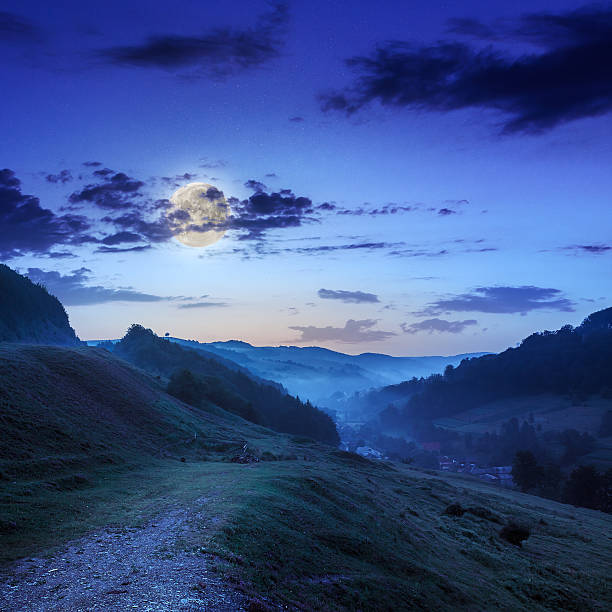 istock cold fog at night in mountains 483563359