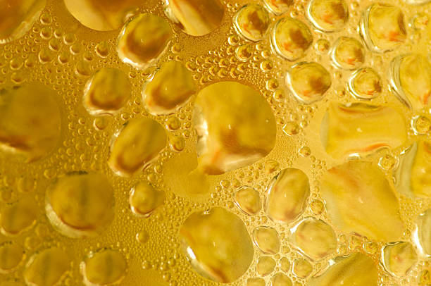 istock Yellow drops on the glass. 483566632