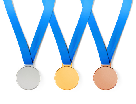 Collection of sports medals on white background with path