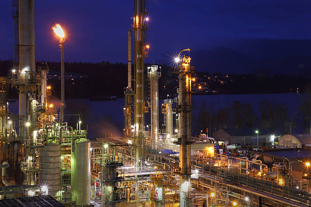 Oil Refinery Night Shift Energy stock photo