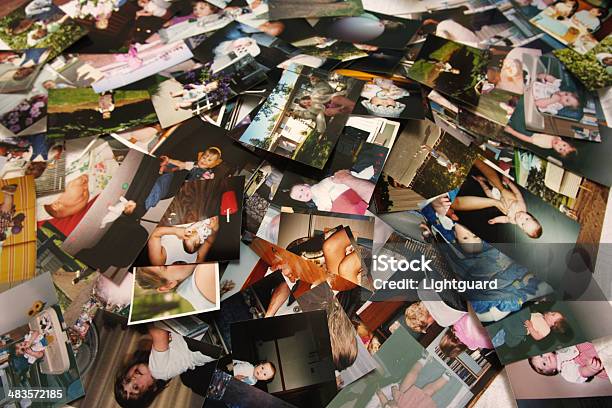 Unorganized Pile Of Photographs Of A Little Girls Life Stock Photo - Download Image Now