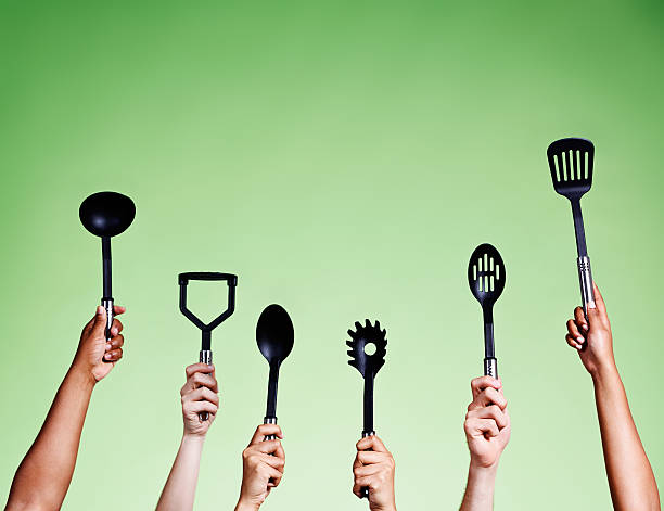 istock Ready for reality TV cooking contests: hands with kitchen utensils 483573465