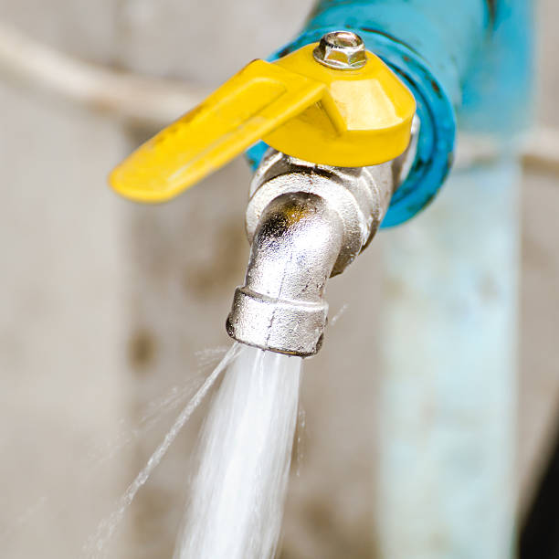 istock outdoor water tap with tube 483574231