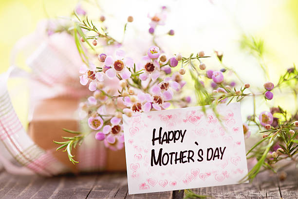 istock Beautiful fresh flower bouquet with morhers day card 483574409