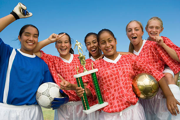 istock Victorious Girls Soccer Team 483575199