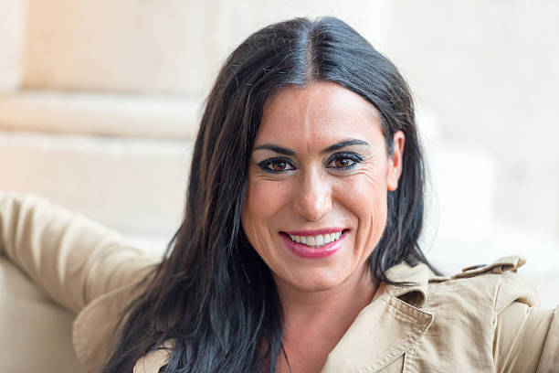istock Mid adult smiling woman 483575467